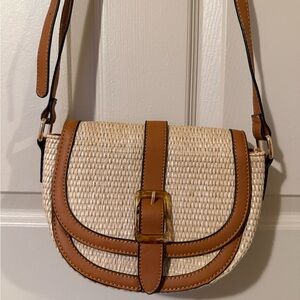 Stylish Izzy & Ali Tan and Cream Woven Crossbody Bag with Buckle Accent